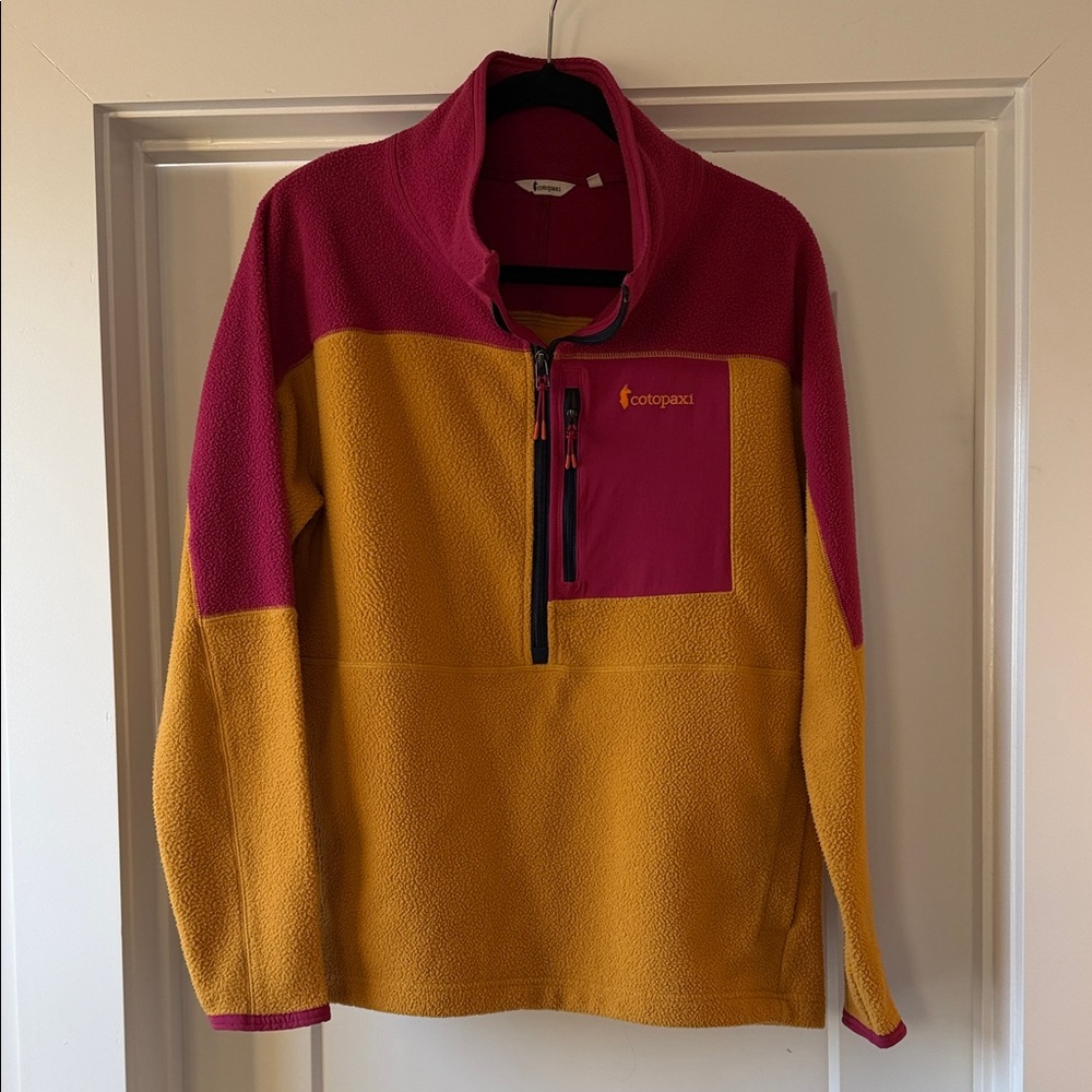 Cotopaxi Abrazo Half Zip Polar Fleece Jacket in Raspberry and Amber